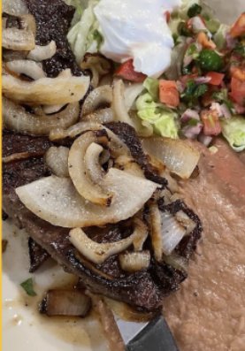 Grilled steak plate with beans and pico de gallo at Camino Real